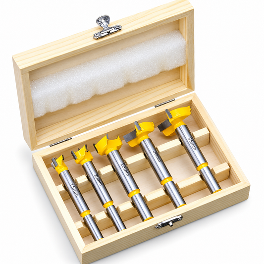 Five yellow Forstner drill bits, 15, 20, 25, 30 and 35 mm, in an open wooden storage case
